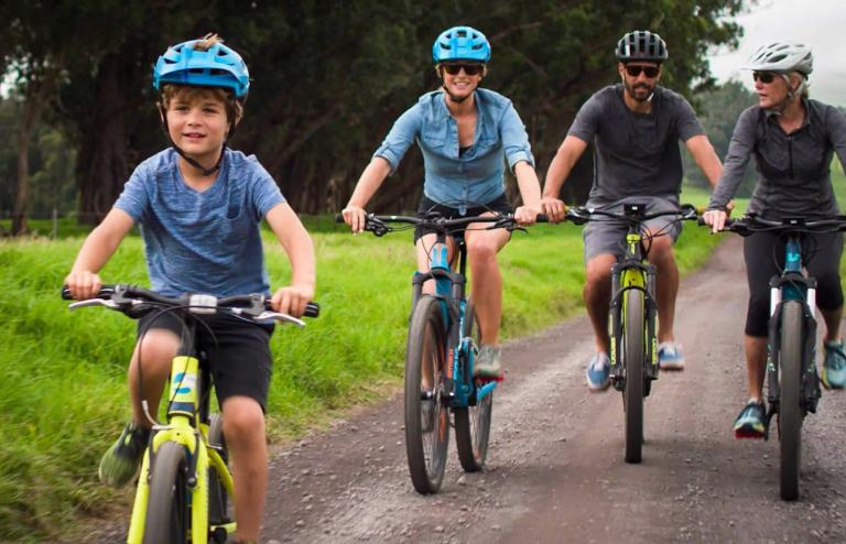 Big-Island-Bike-Tours-family-biking-on-rural-dirt-path