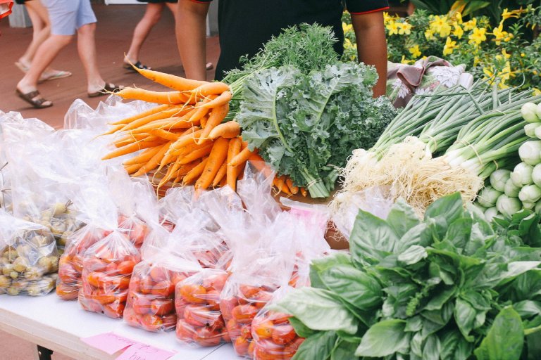 Tasting-Kauai-fresh-vegetables-displayed-at-outdoor-market-2