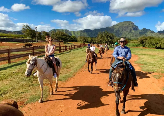 cmj_country_stables-private_paniolo_experience-slider-children-riding-a-horse