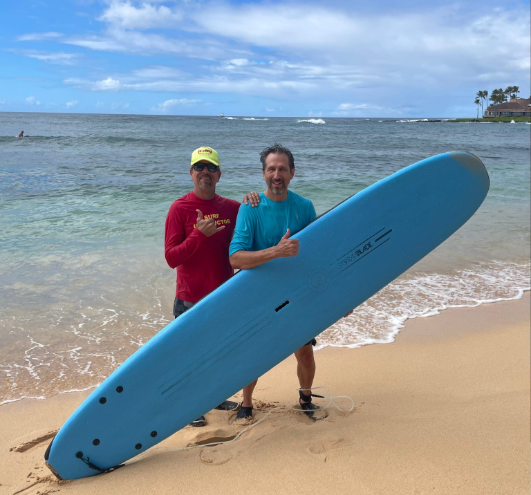 hoku-water-sports-group-surfing-lesson-photo-with-instructor