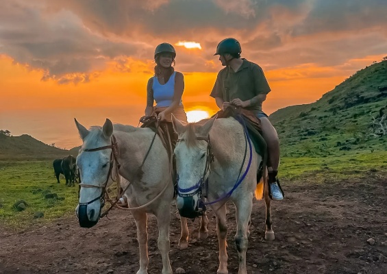 couple riding a white horse on sunset.jpg