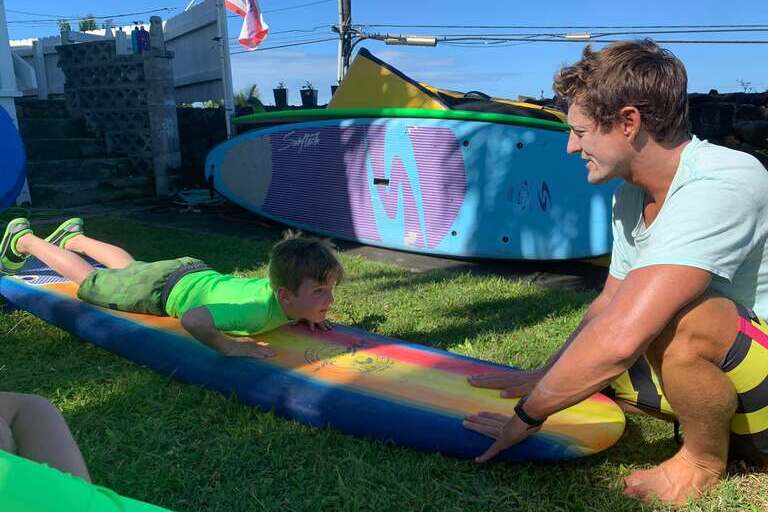 kona_town_surf_adventures__llc_group_lesson_Feature_slide_3.4